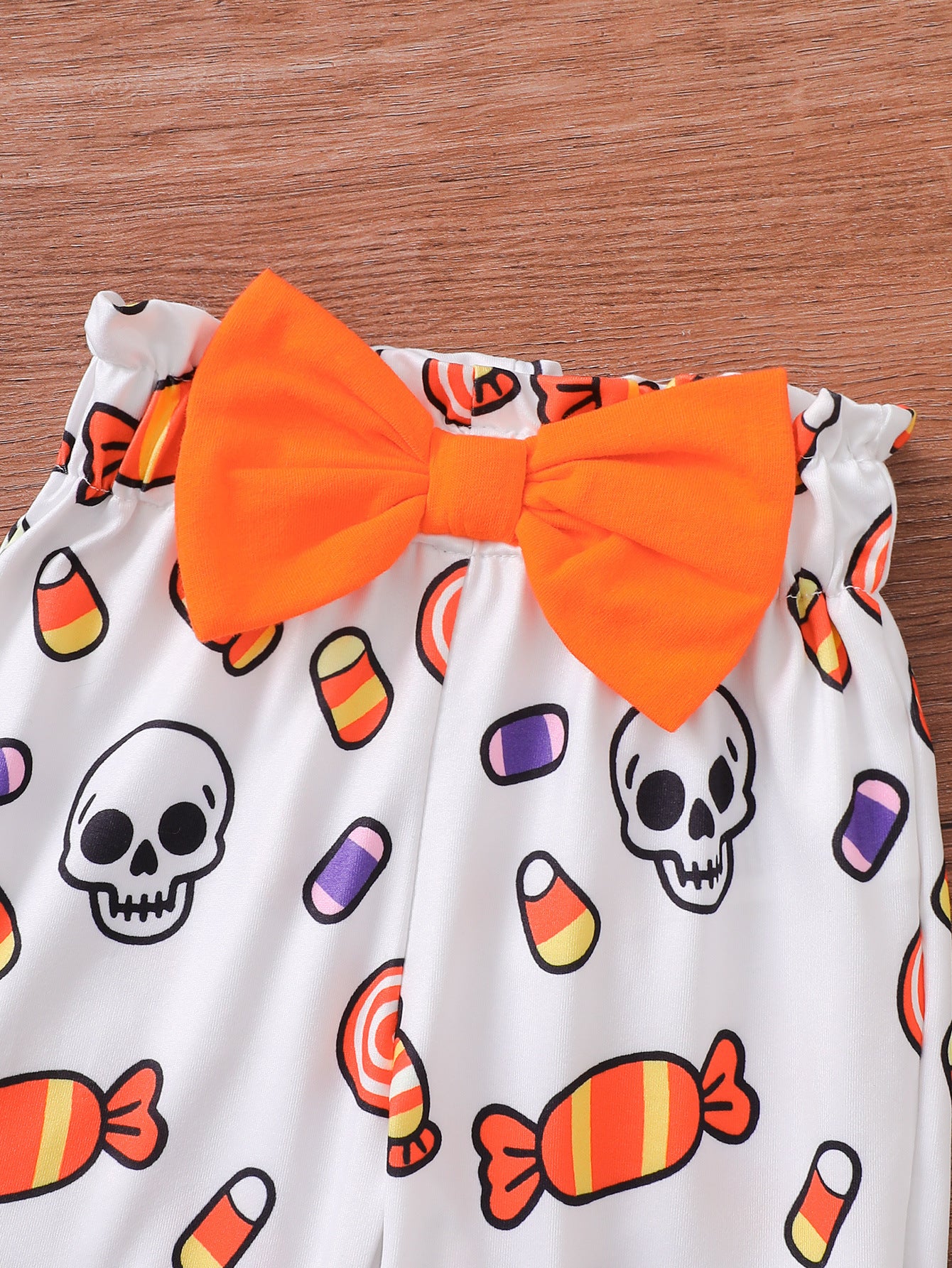 Wholesale 0-18M Baby Girls 3Pcs Ruffle Sleeve Halloween Print Bodysuit Outfit Set, Soft Cotton Knit Pumpkin Skull Ghost Long Sleeve Romper Pants With Bow Headband